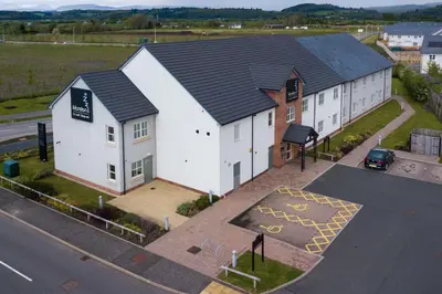 an overhead view of a building with a parking lot at Highland Gate, Stirling by Marston's Inns in Stirling