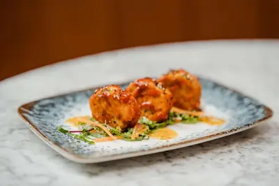 a blue plate with food on a table at Radisson Blu Hotel, Glasgow in Glasgow