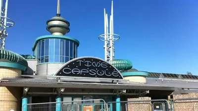 a building with a sign on the top of it at Sunnyside Apartments in Coatbridge