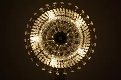 a chandelier with many lights on it at Creag Mhor Lodge in Onich