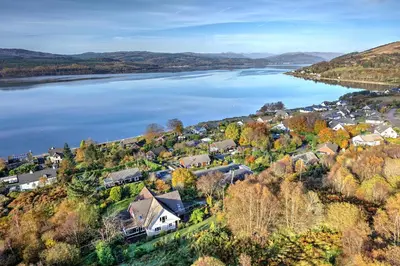 an aerial view of a town next to a lake at ArdFyne on Lochfyne in Strachur