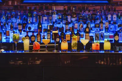 a bar with many different types of wine glasses at Dakota Eurocentral in Motherwell