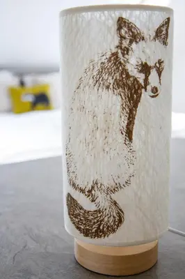 a coffee cup with a fox painted on it at Badgers Den in Linlithgow