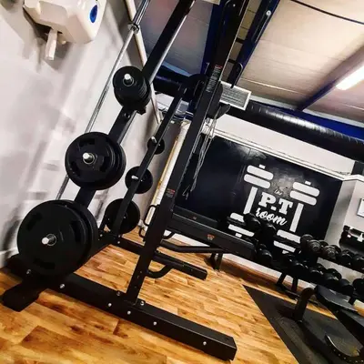a room with a gym with a weight lifting machine at Buchanan Arms Hotel & Leisure, Sure Hotel Collection in Drymen