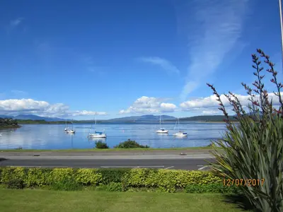 a view of a river with boats in the water at Ronebhal Guest House in Oban