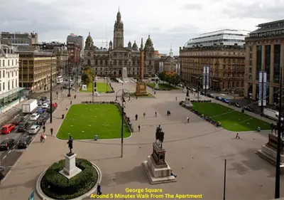 a view of a city with a square and buildings at Glasgow City Centre Apartment in Glasgow