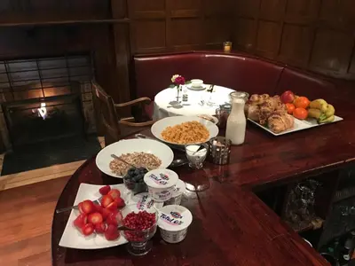 a table with several plates of food on it at Rab Ha's in Glasgow