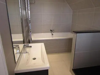 a bathroom with a sink and a bath tub at The Craigie Hotel in Penicuik