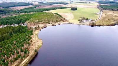 an aerial view of a body of water at Bumble’s Barn in Slamannan