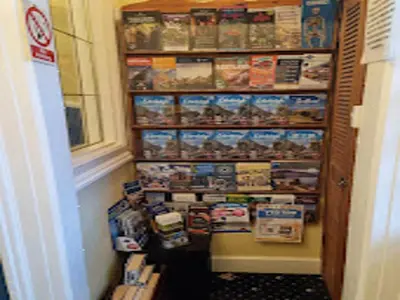 a store with a refrigerator filled with food at Ardleigh House in Edinburgh