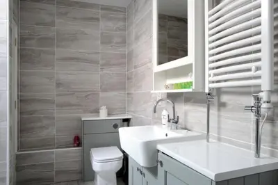 a bathroom with a sink and a toilet at Quiet Ground Floor Mews Flat and parking in Edinburgh