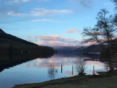 a view of a river with mountains in the background at The Sheiling in Saint Fillans