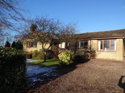 a house with a driveway in front of it at Wester Muirhouse in Linlithgow