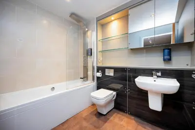 a bathroom with a toilet and a sink at Staycity Aparthotels Edinburgh West End in Edinburgh