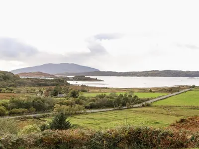 a view of a body of water with mountains in the background at Mullach in Lunga