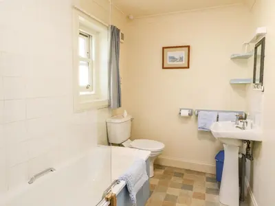 a bathroom with a toilet and a sink at Mullach in Lunga