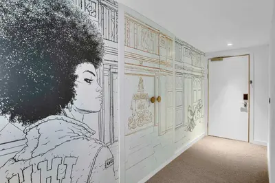 a room with a wall with a drawing on it at Radisson RED Hotel, Glasgow in Glasgow