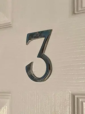 a number on a door with the number seven on it at Barriemore Oban in Oban