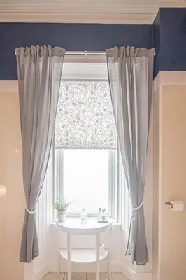 a window with a table in front of a curtain at Barriemore Oban in Oban