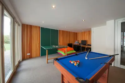 a room with a pool table and a desk at Mains of Taymouth Country Estate 4* Houses in Kenmore