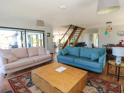 a living room with two couches and a coffee table at Sobrachan in Braevallich