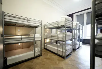 a group of bunk beds in a room at Revolver Edinburgh in Edinburgh