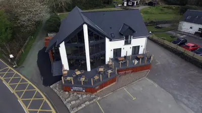 an aerial view of a building with a restaurant at The Corran in Onich