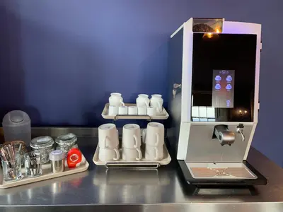 a kitchen counter with a coffee maker and a mixer at The Kelvin Hotel in Oban