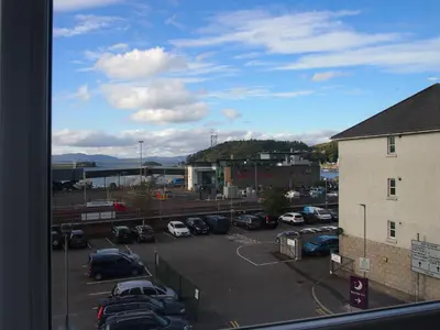 a view of a parking lot with cars parked at The Kelvin Hotel in Oban