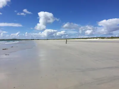 a person standing on the beach at Tyndrum Lodges in Tyndrum