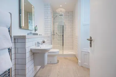 a bathroom with a toilet and a sink and a shower at Toby Carvery Edinburgh West by Innkeeper's Collection in Edinburgh