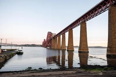 a bridge over the water with a boat in it at The Hawes Inn by Innkeeper's Collection in Queensferry