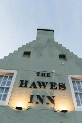 a sign on the side of a building at The Hawes Inn by Innkeeper's Collection in Queensferry