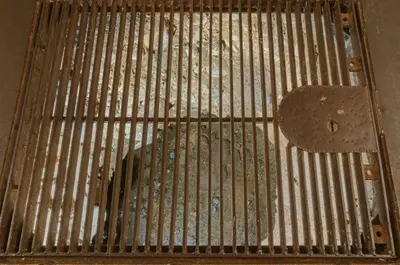 a metal grate with a symbol on it at Barcaldine Castle in Oban