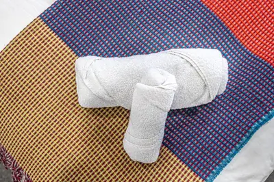 a pair of white socks on top of an umbrella at Prime Commuter Executive Apartment Dunfermline in Dunfermline
