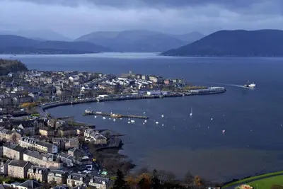 an aerial view of a city with a harbor at Cameron Cottage in Inverkip