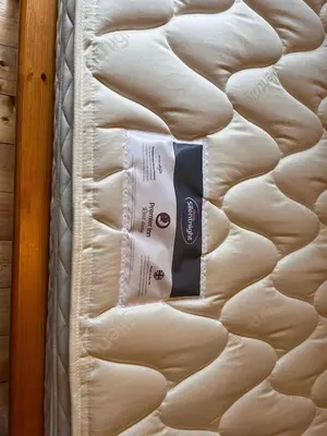 a mattress with a label on the side of it at Laich Cottage in Appin