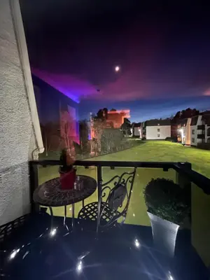 a view from the balcony at night at Gleneagles Lettings in Auchterarder