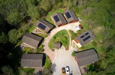 an aerial view of a house with a driveway at Birchbrae Highland Lodges in Onich