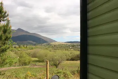 a view of a mountain range from a house at Glen View in Taynuilt