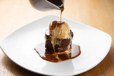 a piece of chocolate ice cream on a white plate at The Murray Park Hotel in Crieff