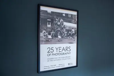 a framed picture of a photograph of a train at JOIVY Bright 1 bed flat, close to Princess Street in Edinburgh