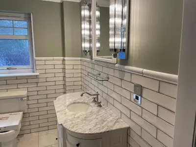 a bathroom with a sink and a mirror at Stormfront Luxury Hideaway Glencoe Ballachulish Highlands Near Fortwilliam in Glencoe
