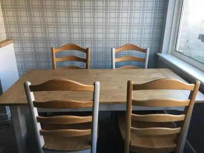 a wooden table with four chairs around it at Old Police House Causewayhead Stirling in Stirling
