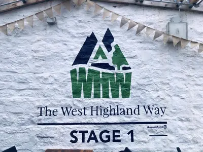 ahm the west highland way signage on a building at The Drymen Inn in Drymen
