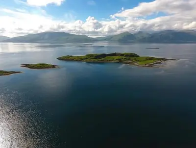 an island in the middle of a large body of water at Sealladh in Port Appin