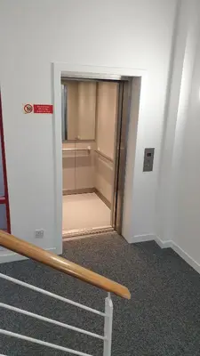 an empty room with a door to a closet at Premier Lodge in Falkirk