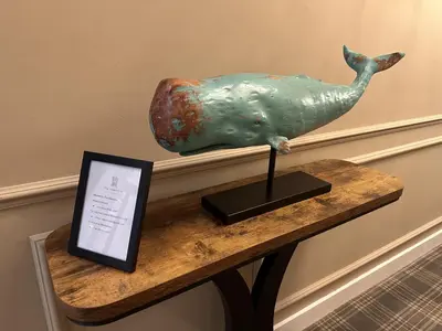 a statue of a bird sitting on a table at The Valentine - Townhouse Hotel - Adults Only in Edinburgh