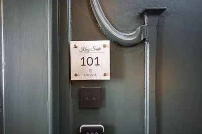 a sign on a door that says obey sniff at Bonnie Hotel - Smart Boutique ApartHotel - Haymarket Edinburgh in Edinburgh