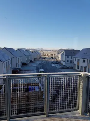 a view from a balcony of a row of houses at 1 Royal View Apartments in Stirling